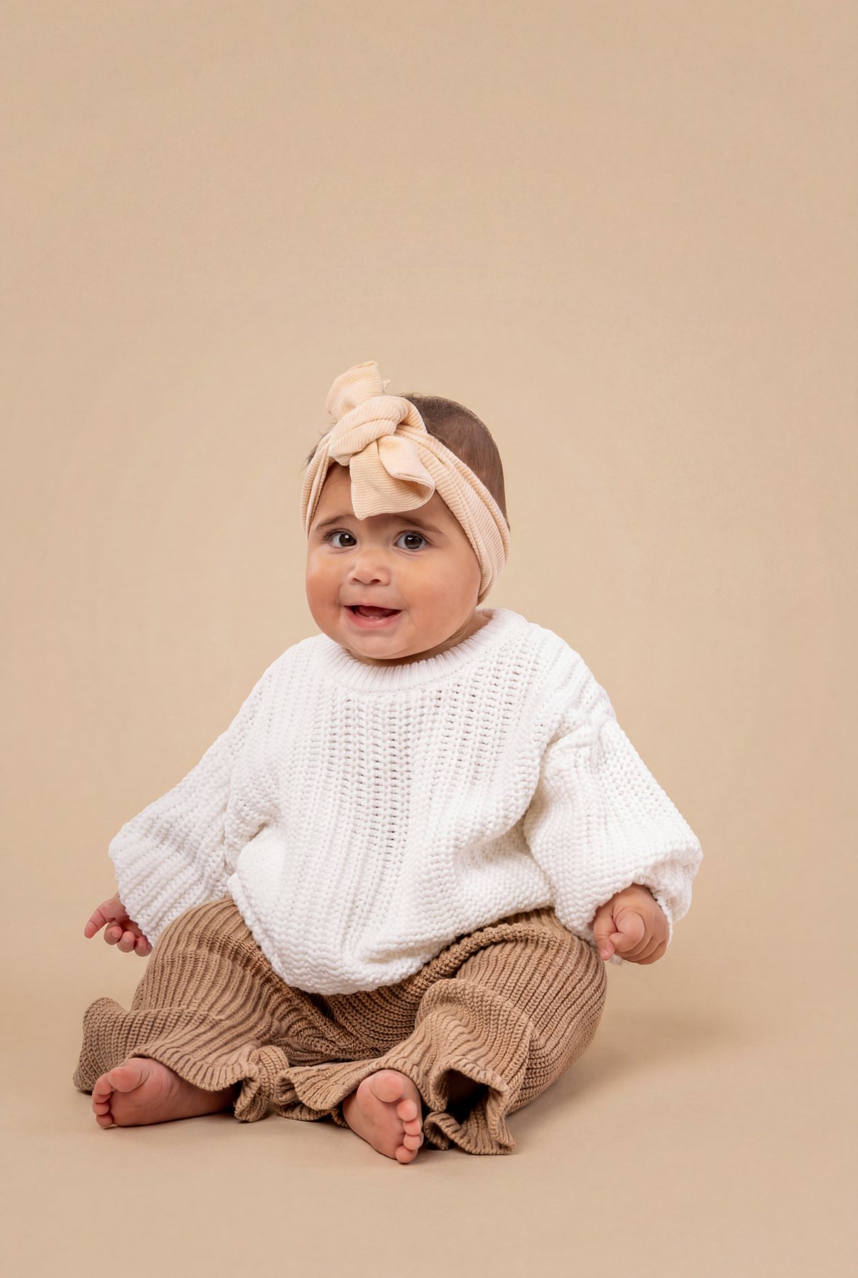 A child wearing Little Royals clothing